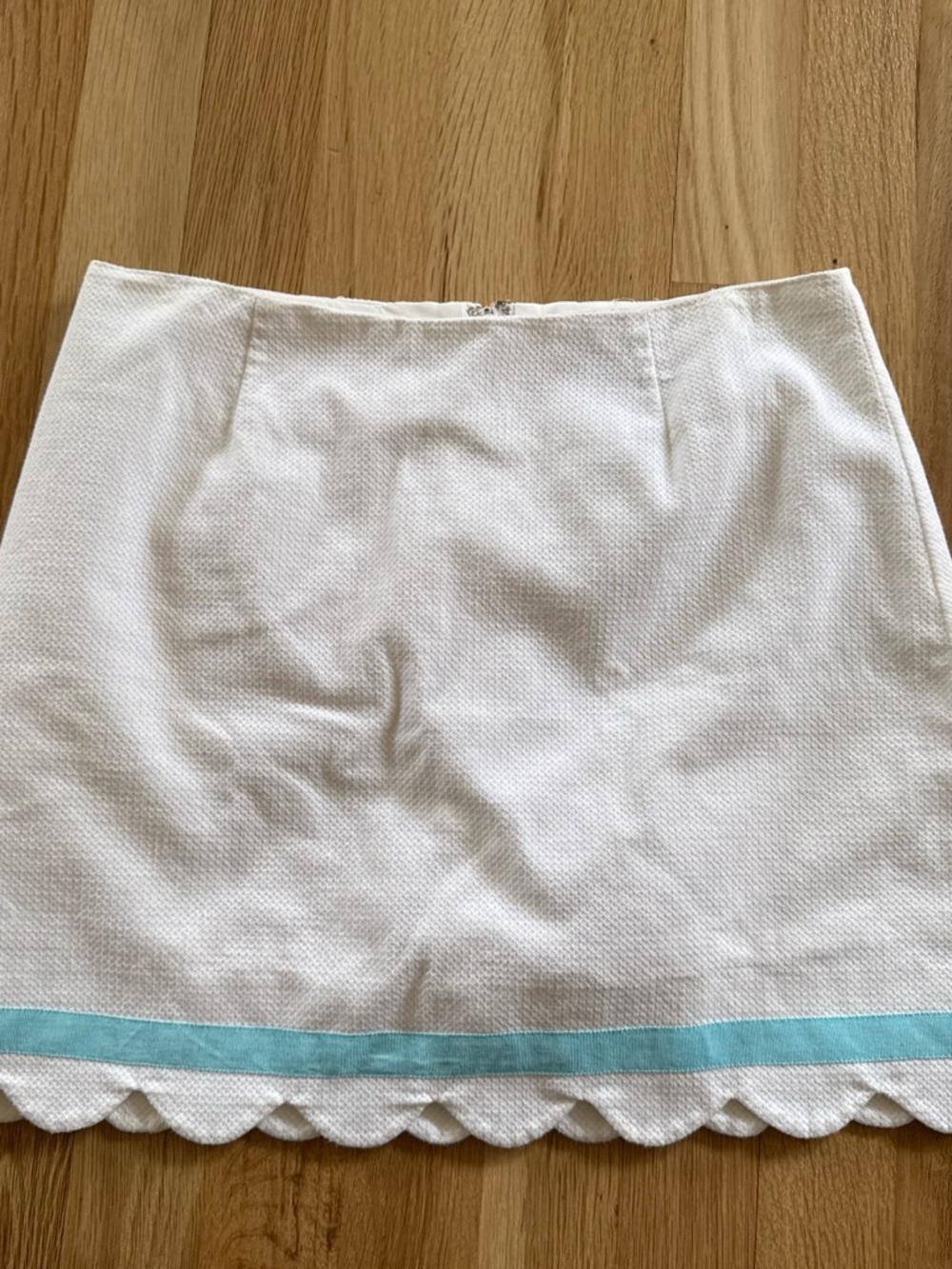Lilly Pulitzer white mini skirt with blue scalloped hem